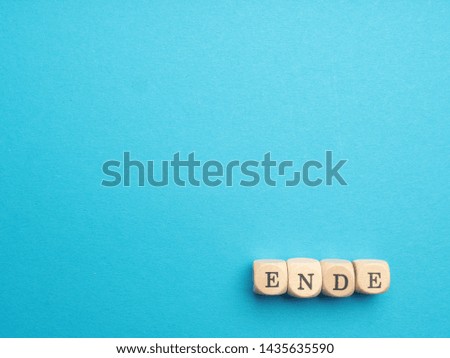 Similar – Image, Stock Photo Small wooden blocks with character icons and a gear shape around them