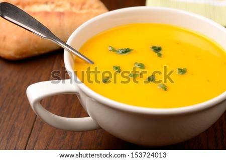 Hokkaido pumpkin cream soup on a kitchen table