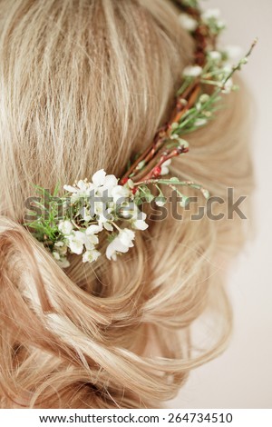 Tender beauty bride\'s hair with flowers wreath on it
