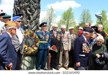 TORONTO  MAY 09: The group of veterans near the monument  at annual meeting of veterans of 2-nd World War in May 09 2012 in Toronto, Canada.