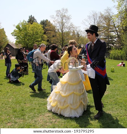 TORONTO Ã¢Â?Â? MAY 19: Cinderella dancing at  ball  in Black Creek Pioneer Village in May 19, 2014 in Toronto, Canada.