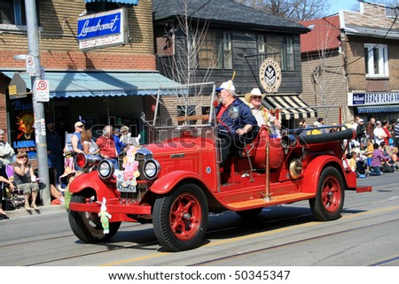 TORONTO, CANADA - APRIL 4:  Retro fire car takes part in an annual Easter Parade 2010 April 4, 2010 in Toronto, Canada.