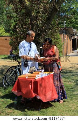 TORONTO – JULY 17:  Book selling at 39th Annual festival of India in July 17 2011 on Central Island in Toronto, Canada. The festival is a popular annual tourist attraction  for the last 39 years.
