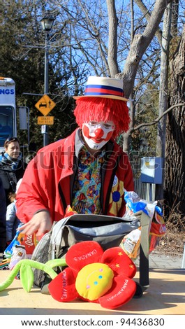 RICHMOND HILL – FEBRUARY 05: The clown in costume  at Winter Carnival in Mill Pond Park in Richmond Hill, Canada in February 05, 2012.