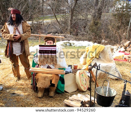 RICHMOND HILL – FEBRUARY 05:  people of First Nation at Winter Carnival in Mill Pond Park in Richmond Hill, Canada in February 05, 2012.