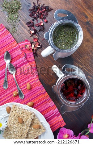 Beautiful morning with hot fruit cup of tea with healthy snack