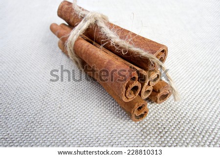 Sweet brown cinnamon spice sticks on white background