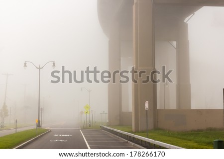 Buffalo New York Skyway bridge leading into downtown Buffalo with fog.
