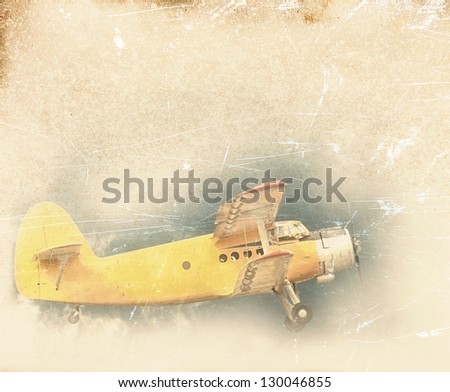 Old flying biplane, retro aviation background