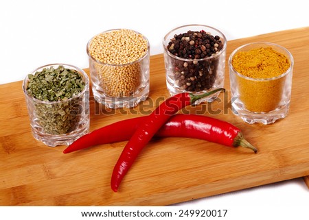 Fragrant spices with red pepper. Isolated on white