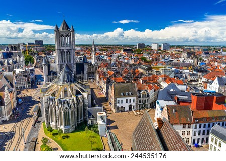 Skyline of Gent, Ghent in West Flanders, Belgium, seen from Belfort tower with St. Nicholas Church.