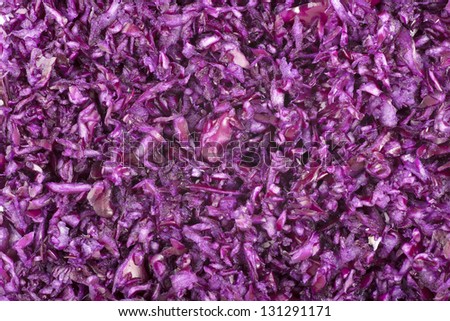 Finely grated red cabbage filling frame for food background