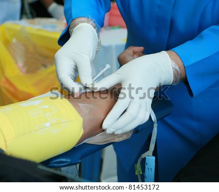 nurse hand and needle injection