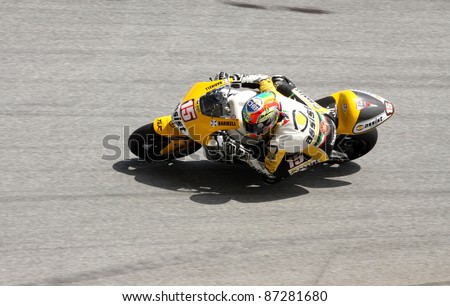 SEPANG,MALAYSIA-OCT.21:Alex De Angelis of JIR Moto2 Team in action during practice session of Shell Advance Malaysian Moto GrandPrix on Oct. 21 2011 in Sepang, Malaysia.