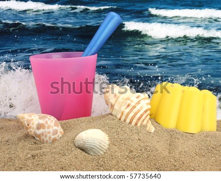 Memories of the Mediterranean Sea, still life with toy and photo sea photo on background