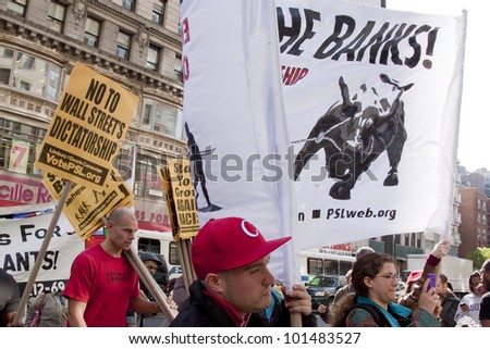 NEW YORK - MAY 1: Protesters march to Union Square during Occupy Wall St \'May Day\' protests on May 1, 2012 in New York, NY.