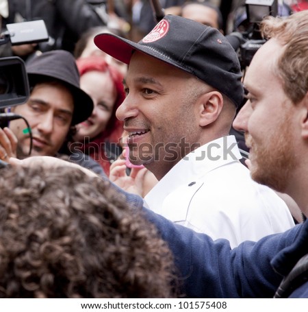 NEW YORK - MAY 1: Rage Against The Machine guitarist Tom Morello speaks to the media about the Occupy Guitarmy effort during May Day protests in Bryant Park on May 1, 2012 in New York, NY.