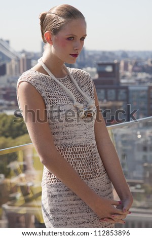NEW YORK - SEPT 10: A model poses at the ANN YEE Spring/Summer 2013 collection presentation at The Standard East Village Penthouse during Mercedes-Benz Fashion Week in New York on September 10, 2012.