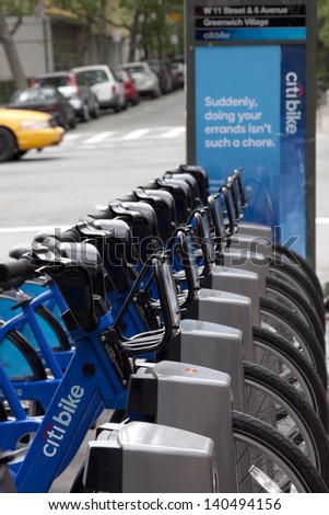 NEW YORK-MAY 25: New blue Citi Bikes lined up at the Greenwich Village station at 6th Avenue in Manhattan on May 25, 2013. The Bike-Share program begins on Memorial Day.