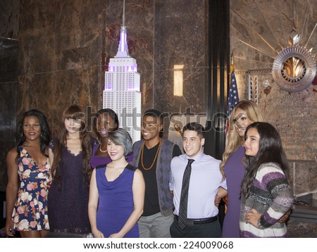NEW YORK - OCT 16, 2014: Laverne Cox, actress in \'Orange Is The New Black\' and cast members from her documentary \'The T Word\' at the ceremony to light the Empire State Building purple.
