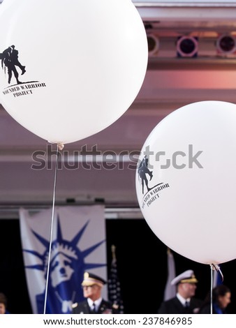 NEW YORK - NOV 11, 2014: A close up of black and white Wounded Warrior Project balloons that were held by vets marching in the 2014 America\'s Parade on Veterans Day in New York on November 11, 2014.
