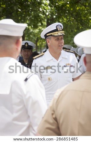 NEW YORK - MAY 22 2015: Admiral Phil Davidson, Commander, US Fleet Forces Command, speaks to personnel during the re-enlistment and promotion ceremony at the National September 11 Memorial site.