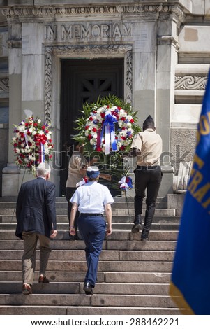 NEW YORK - MAY 25 2015: Rear Admiral Linda Fagan, First Coast Guard District, walks to lay a wreath at the Memorial Day Observance service at the Soldiers and Sailors Monument during Fleet Week 2015.