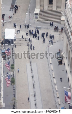 NEW YORK - NOV 17: Aerial view of Broad Street and entrance to the NY Stock Exchange on November 17, 2011 in New York City, NY. Police temporarily cleared the area after protesters impeded traffic.