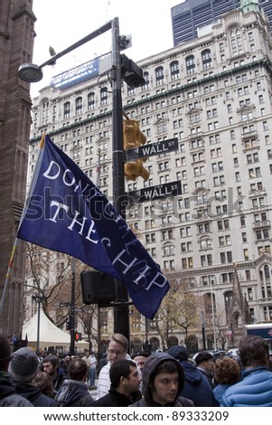 NEW YORK - NOV 17: A banner that reads 'Don't Give Up The Ship' on Broadway and Wall Streets mid-morning on Occupy Wall Streets  'Day of Disruption' protest on November 17, 2011 in New York City, NY.