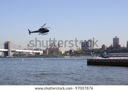 NEW YORK – OCT 8: Helicopters take off and land along the East River in lower Manhattan on October 8, 2011 in New York City.