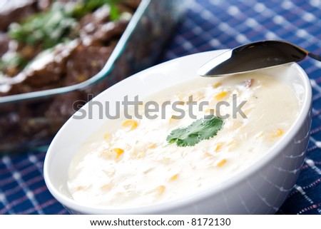 A shot of creamy corn soup in a banquet