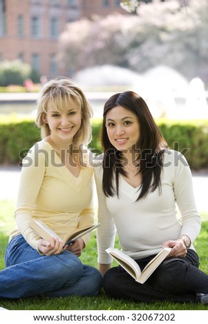 A shot of two college students studying on campus