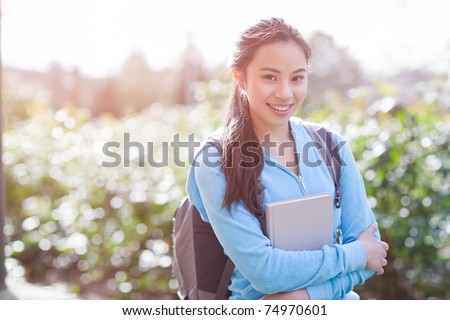 A shot of an Asian college student on campus