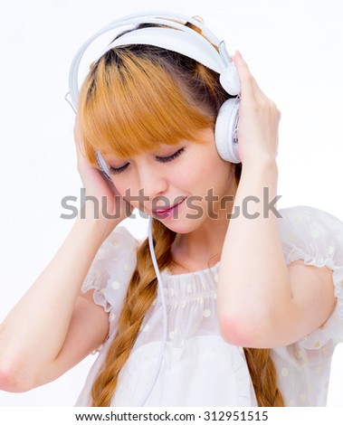 girl listen to music by headset / Asian lady japanese style