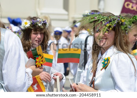 VILNIUS, LITHUANIA - JULY 6: Unidentified peoples in traditional Lithuanian Song Celebration on July 6, 2014 in Vilnius, Lithuania. Song Festival is Lithuania\'s main cultural event for 2014.