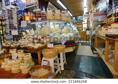 CHANIA, GREECE - AUGUST 12: Unknown people sell local food in Chania, Crete, Greece on 12 August 2014. The cross-shaped market (Agora) of Chania was built in 1911-1913.