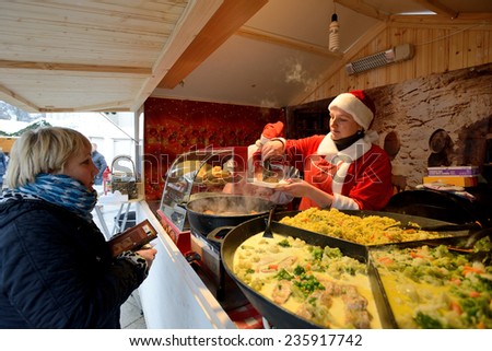 VILNIUS, LITHUANIA - DECEMBER 7: Unidentified people trade food in annual traditional Christmas fair on December 7, 2014 in Vilnius, Lithuania