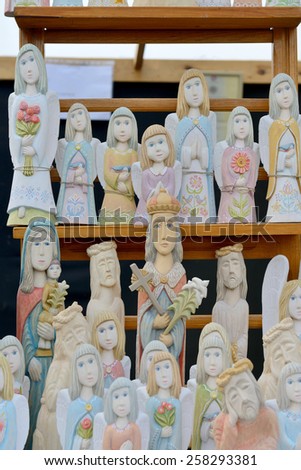 VILNIUS, LITHUANIA - MARCH 6: Traditional hand made wood angels in annual traditional crafts fair - Kaziuko fair on Mar 6, 2015 in Vilnius, Lithuania