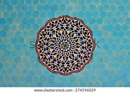 YAZD - APRIL 17: Tiled background, oriental ornaments from Jame Mosque in Yazd, southern Iran on April 17, 2015. The 12th-century mosque is still in use today.