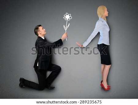 Business man giving flower to girlfriend