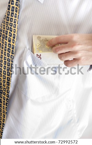 Euro banknotes in shirt pocket