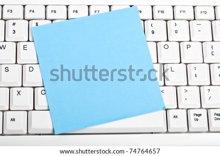 Post-it on an white keyboard