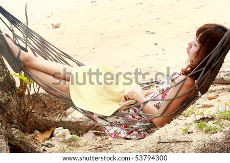 woman hammock sleep on the beach in Thailand.