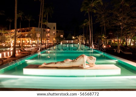 Swimming pool, night, hotel in thailand.
