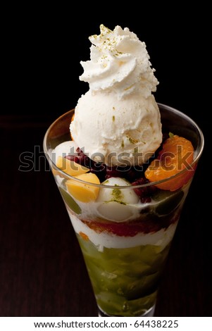 whipped cream vanilla ice cream parfait with orange fruit and red bean