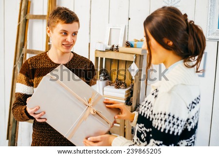 Loving wife gives her husband a gift