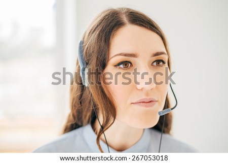 Close-up portrait of a customer service agent near the window