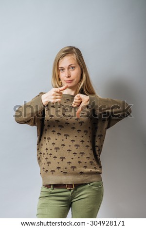 business concept - businesswoman with thumbs up and down