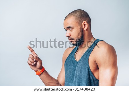 young cool black man pointing