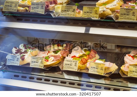 PRAGUE, CZECH REPUBLIC - AUGUST 25, 2015: Bakery products, cakes and sandwiches on display in a pastry cafe near the Central square Old Town of Prague, Czech Republic
